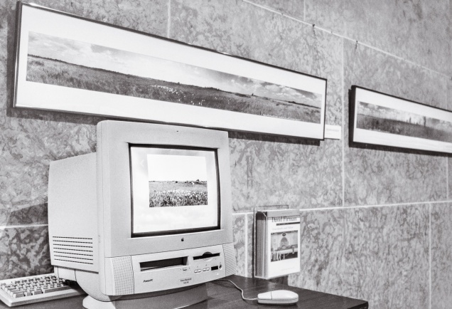 Installation view, Grasslands and Silver, Winnipeg Art Gallery, 1997. On the walls are prints from the Grasslands series. On the computer is the Grasslands CD-ROM.